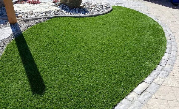 Artificial Turf - Tired of the grind of mowing and watering the yard? Got a shady spot where you cannot get grass to grow? Maybe it’s time to replace your real grass with artificial grass. As a synthetic replacement, it requires less maintenance and stays green. The best artificial grass lets you enjoy most of the benefits of a lush lawn, including appearance. The right turf for you depends on where you want to install it, how you want it to look, who will use the grass (like pets), and the amount of foot traffic. We do all types of installations! Give us a call today! 613-415-5800 Andrew Artificial Turf - Tired of the grind of mowing and watering the yard? Got a shady spot where you cannot get grass to grow? Maybe it’s time to replace your real grass with artificial grass. As a synthetic replacement, it requires less maintenance and stays green. The best artificial grass lets you enjoy most of the benefits of a lush lawn, including appearance. The right turf for you depends on where you want to install it, how you want it to look, who will use the grass (like pets), and the amount of foot traffic. We do all types of installations! Give us a call today! 613-415-5800 Andrew