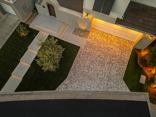 Huntington Beach project - Huntington Beach project. Floating steps, washed concrete, travertine, cobblestone driveway. Lighting. Olive tree.
