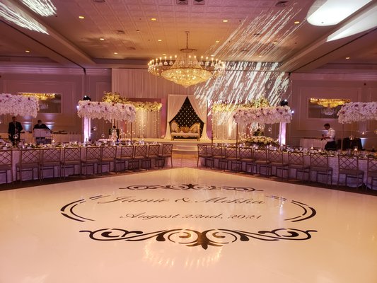 Vinyl Flooring & Monogram - Elevate your event space with our sophisticated vinyl flooring featuring a personalized monogram design. This stylish and durable flooring option not only adds a touch of elegance but also provides a custom flair that reflects your unique style. Vinyl Flooring & Monogram - Elevate your event space with our sophisticated vinyl flooring featuring a personalized monogram design. This stylish and durable flooring option not only adds a touch of elegance but also provides a custom flair that reflects your unique style.