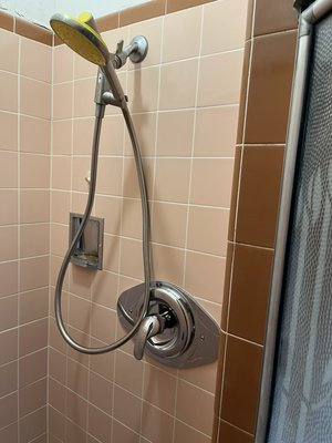 Shower Valve replacement - Client had water leaking from handles on shower valve. After removing the handles and extracting the stem inside. We went on a hunt to find a replacement stem for this old valve installed in the 1950s. After checking the most promising plumber supply shops, we ran into a dead end. The next move was to remove the old valve and install a new modern style. We install a smitty plate around the valve cover to make the replacement look tight. All work completed is under warranty.