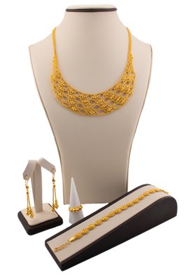 Dubai Gold Set - Handmade 21k Yellow gold set epitomizes elegance and luxury, crafted with exquisite detail and precision. Sets will include a variety of matching accessories. Dubai Gold Set - Handmade 21k Yellow gold set epitomizes elegance and luxury, crafted with exquisite detail and precision. Sets will include a variety of matching accessories.