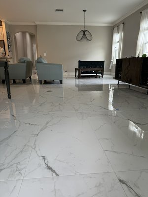 Modern Elegance 24x48 Tile Upgrade - Tile Replacement (24” x 48”)
We completed the removal of outdated tile flooring and installed brand-new 24” x 48” porcelain tiles for a modern, upscale finish. The process included careful demolition and disposal of the old tile, surface preparation to ensure a smooth and level foundation, and precise installation of the large-format tiles. The result is a clean, seamless look with minimal grout lines, adding both elegance and durability to the space. Modern Elegance 24x48 Tile Upgrade - Tile Replacement (24” x 48”)
We completed the removal of outdated tile flooring and installed brand-new 24” x 48” porcelain tiles for a modern, upscale finish. The process included careful demolition and disposal of the old tile, surface preparation to ensure a smooth and level foundation, and precise installation of the large-format tiles. The result is a clean, seamless look with minimal grout lines, adding both elegance and durability to the space.