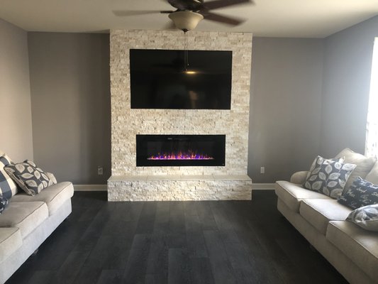 Stone fireplace/tv built in - For this client, they were looking to create an eye catching accent for this blank wall. Stone fireplace/tv built in - For this client, they were looking to create an eye catching accent for this blank wall.