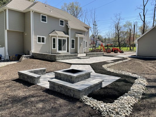Multi Level Patio with Fire Pit - This Multi Level Patio with Fire Pit with Property Drainage Featured Techo Bloc stone in Shale Gray