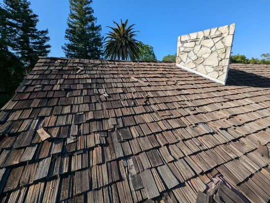 Cool Roof Shingle Installation - In the beautiful city of Northridge, CA, our team at Immaculate Roofing Inc. transformed an aging cedar shake roof into a modern, energy-efficient system. The homeowner wanted a roofing solution that combined durability, energy efficiency, and aesthetic appeal, while also complying with California’s building standards.
Our Solution
We removed the existing cedar shake roofing and installed CertainTeed Landmark Solaris shingles a premium Title 24 Cool Roof reflective shingle designed to reduce heat absorption and enhance energy performance. The new roof not only improved the home’s structural protection but also elevated its curb appeal with a timeless and elegant finish. The transformation gave the home a fresh, modern appearance while ensuring long-lasting protection. With the Landmark Solaris system, the homeowner benefits from both style and performance, backed by CertainTeed’s trusted warranty. Cool Roof Shingle Installation - In the beautiful city of Northridge, CA, our team at Immaculate Roofing Inc. transformed an aging cedar shake roof into a modern, energy-efficient system. The homeowner wanted a roofing solution that combined durability, energy efficiency, and aesthetic appeal, while also complying with California’s building standards.
Our Solution
We removed the existing cedar shake roofing and installed CertainTeed Landmark Solaris shingles a premium Title 24 Cool Roof reflective shingle designed to reduce heat absorption and enhance energy performance. The new roof not only improved the home’s structural protection but also elevated its curb appeal with a timeless and elegant finish. The transformation gave the home a fresh, modern appearance while ensuring long-lasting protection. With the Landmark Solaris system, the homeowner benefits from both style and performance, backed by CertainTeed’s trusted warranty.