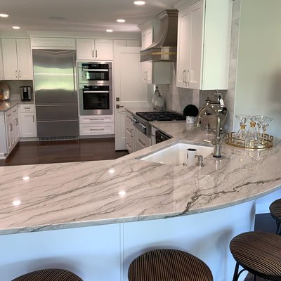 Quartzite stone - Quartzite a natural stone stronger than granite 
3cm slab thickness . full kitchen tile backsplash 
white cabinets to match the countertops and backsplash


quartzite company, quartzite installer, quartzite fabricator, countertop installation, quartzite countertop, quartzite countertop installer, tile backsplash installation, tile, kitchen backsplash, flooring installation, Bathroom remodel services, bathroom tile installation, shower tile installation.
