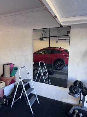 Custom Mirror Installation in Home Gym - In February 2025, YP Craftology successfully completed a custom mirror installation project in a home gym located in Costa Mesa. The task involved mounting two large-format mirrors—each from a different brand with unique mounting configurations—onto a solid concrete wall. This presented a technical challenge that required exact measurements, careful planning, and the use of specialized tools.
Our team marked and drilled the concrete surface with high-precision equipment to accommodate heavy-duty wall anchors. Despite the structural hardness of the wall and the mismatch in mounting holes, both mirrors were installed symmetrically and level, creating a seamless visual flow. The result is a highly functional and aesthetically elevated gym space that the client was thrilled with Custom Mirror Installation in Home Gym - In February 2025, YP Craftology successfully completed a custom mirror installation project in a home gym located in Costa Mesa. The task involved mounting two large-format mirrors—each from a different brand with unique mounting configurations—onto a solid concrete wall. This presented a technical challenge that required exact measurements, careful planning, and the use of specialized tools.
Our team marked and drilled the concrete surface with high-precision equipment to accommodate heavy-duty wall anchors. Despite the structural hardness of the wall and the mismatch in mounting holes, both mirrors were installed symmetrically and level, creating a seamless visual flow. The result is a highly functional and aesthetically elevated gym space that the client was thrilled with