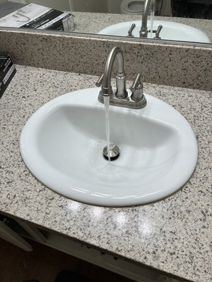 Bath sink faucet and assembly replacement - This bathroom sink upgrade was replaced with new gloss white over mount sink bowl and with new chrome finish faucet with matching pop up assembly. Bath sink faucet and assembly replacement - This bathroom sink upgrade was replaced with new gloss white over mount sink bowl and with new chrome finish faucet with matching pop up assembly.