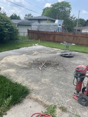Backyard Renovation - This Westerville home had a failing concrete slab that was deteriorating and uneven. The yard has devoid of landscaping and would constantly flood even in low amounts of rain.
The existing slab was demolished and the yard was regraded so that water flowed away from the property.
Once the earthwork was complete 4, 48" deep by 12" diameter concrete posts were set as the foundation for a pergola to provide shade and decoration for a section of the patio. Crushed limestone was then laid and compacted in 3 2" thick lifts to provide the necessary structural support for the patio. Gravel needs to be compacted in lifts and be at least 4" thick, or the patio will settle and tiles will become unlevel and will eventually break.
Once the subbase was completed, sand was screeded across the gravel to achieve the consistent slope of 1/4" per foot so that water would drain away from the house. The layout was then squared using string lines and paver tiles could be placed down. Chalk lines and the 3-4-5 Pythagorean triangle method was used to ensure the tiles lined up with one another the whole way across. The final paver tiles along the edges were cut to size using a diamond blade miter saw. Edging strips were installed along the perimeter and grout was used for infill between the pavers to ensure none of the pavers move from their current position.
1 maple tree, 2 dogwoods, and 2 Acoma crape myrtle trees were planted along with hostas and boxwoods. Topsoil was brought in for regrading and seeding along with mulch for moisture retention for all the new plants. Backyard Renovation - This Westerville home had a failing concrete slab that was deteriorating and uneven. The yard has devoid of landscaping and would constantly flood even in low amounts of rain.
The existing slab was demolished and the yard was regraded so that water flowed away from the property.
Once the earthwork was complete 4, 48" deep by 12" diameter concrete posts were set as the foundation for a pergola to provide shade and decoration for a section of the patio. Crushed limestone was then laid and compacted in 3 2" thick lifts to provide the necessary structural support for the patio. Gravel needs to be compacted in lifts and be at least 4" thick, or the patio will settle and tiles will become unlevel and will eventually break.
Once the subbase was completed, sand was screeded across the gravel to achieve the consistent slope of 1/4" per foot so that water would drain away from the house. The layout was then squared using string lines and paver tiles could be placed down. Chalk lines and the 3-4-5 Pythagorean triangle method was used to ensure the tiles lined up with one another the whole way across. The final paver tiles along the edges were cut to size using a diamond blade miter saw. Edging strips were installed along the perimeter and grout was used for infill between the pavers to ensure none of the pavers move from their current position.
1 maple tree, 2 dogwoods, and 2 Acoma crape myrtle trees were planted along with hostas and boxwoods. Topsoil was brought in for regrading and seeding along with mulch for moisture retention for all the new plants.