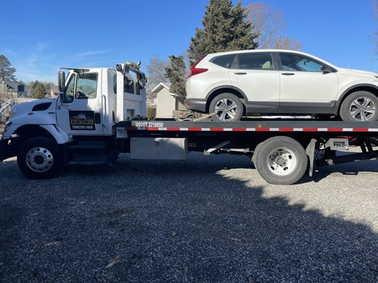 Towing a car - We are a licensed towing company. Our trucks are insured and we will safely transport your vehicle. Towing a car - We are a licensed towing company. Our trucks are insured and we will safely transport your vehicle.