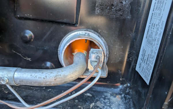 Water Heater Repair & Fridge Diagnosis - customer called us out to his campground on a Saturday — both his small RV fridge (Norcold N306) and his water heater stopped working at the same time. We diagnosed the propane system and found the water heater's burner tract was clogged; we disassembled it, cleaned the tract, and got it firing normally again. On the fridge, we found the sealed ammonia cooling system had failed, so we gave the customer replacement options for the cooling unit or the whole fridge. Once the water heater was running, we walked him through how to use it properly while towing and camping — he was very happy with the fast, on-site diagnosis and repair.