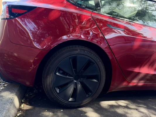 TESLA Highland Repair - This 2026 Tesla Highland hit a post - we completed a full metal overhaul, welding, pulling and hammering - following fill and prime before painting.