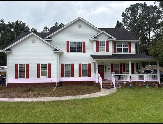 Two story soft wash - This beautiful two-story home received a complete soft wash treatment by Cover and Candor LLC. We carefully cleaned all vinyl siding, trim, gutters, and porch surfaces using our low-pressure system to safely lift away mildew, algae, and surface buildup without damaging the exterior. The result: bright, restored curb appeal and long-lasting protection for the siding and brick foundation.

From the wraparound porch to the upper gables, every detail was treated with precision — leaving the property fresh, clean, and ready to impress.