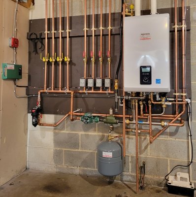 Gas Boiler Installation - This customers old inefficient oil boiler finally stopped operating, It was time to upgrade to a new high efficiency gas boiler. This boiler will keep the customers home comfortable and the domestic water hot on demand.