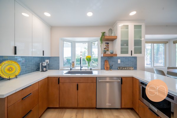 Mid- Century Vibes - Mid-century design is what this house is all about! Using unique accent tiles to revive the old hidden fireplace and entry way, with seamless cabinetry bring together a colorful balance in the interior design. This house has a calm atmosphere and makes you appreciate the space wherever you look. Mid- Century Vibes - Mid-century design is what this house is all about! Using unique accent tiles to revive the old hidden fireplace and entry way, with seamless cabinetry bring together a colorful balance in the interior design. This house has a calm atmosphere and makes you appreciate the space wherever you look.