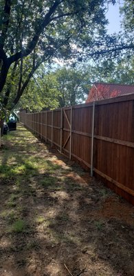 Residential Fencing - Residential fencing usually made of vertical posts connected with horizontal sections of sturdy material or materials, as wood, metal, vinyl, or wire, used to prevent entrance, to confine, or to mark a boundary