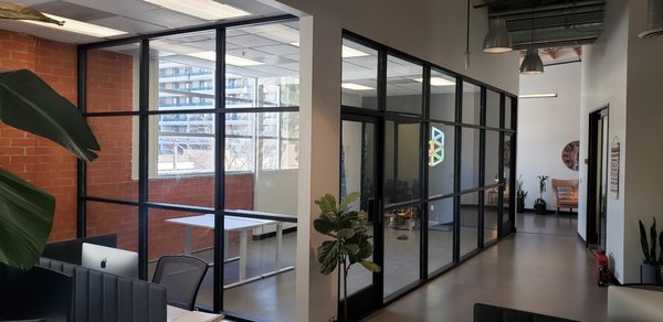 Custom-Built Glass Offices - Upgrade your workspace with custom glass offices that combine modern design, functionality, and professionalism. We specialize in designing and installing high-quality glass office enclosures, partitions, conference rooms, and executive offices tailored to your unique space. Glass offices create an open, bright environment that maximizes natural light while maintaining privacy and a polished appearance.
Whether you're renovating an existing office or building a new commercial space, our team delivers expert craftsmanship, precision installation, and customized solutions that elevate the look and feel of your business. From frameless glass walls to complete office build-outs, we help create workspaces that are both stylish and practical. Custom-Built Glass Offices - Upgrade your workspace with custom glass offices that combine modern design, functionality, and professionalism. We specialize in designing and installing high-quality glass office enclosures, partitions, conference rooms, and executive offices tailored to your unique space. Glass offices create an open, bright environment that maximizes natural light while maintaining privacy and a polished appearance.
Whether you're renovating an existing office or building a new commercial space, our team delivers expert craftsmanship, precision installation, and customized solutions that elevate the look and feel of your business. From frameless glass walls to complete office build-outs, we help create workspaces that are both stylish and practical.