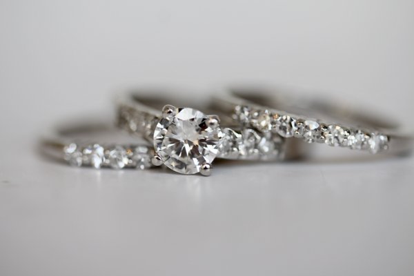 Wedding Set Remount - We used diamonds from 4 different dated Heirloom rings to Reset into a brand new wedding set in platinum. In-store Credit for the dated rings was given to the customer towards the redesign and mounting of her diamonds. Wedding Set Remount - We used diamonds from 4 different dated Heirloom rings to Reset into a brand new wedding set in platinum. In-store Credit for the dated rings was given to the customer towards the redesign and mounting of her diamonds.