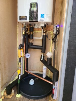 Navien cross-over set-up - Navien 240A re-circulation set-up using crossover set-up.  Works when you cannot get a return line back to unit.  Works amazingly!