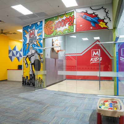 On-Site Childcare, No Reservations Required - We know that being able to bring your kids to the gym helps you stay consistent with your fitness routine. That’s why Mountainside Fitness offers interactive childcare, allowing you to drop off your children for up to two hours while you work out. We believe a healthy family is a happy family, and when you’re looking for a top-rated, state-of-the-art fitness center with childcare, we invite you to stop in to see our gyms. We’ll give the whole family a tour of our clean, bright, and welcoming facility. Our MKids Childcare facilities offer additional programming, including story time and, at select locations, kids’ exercise classes. Childcare options vary by club.
