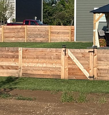 4’ Horizontal Cedar - A horizontal cedar fence provides a modern, sleek aesthetic with natural durability and resistance to rot and insects. 4’ Horizontal Cedar - A horizontal cedar fence provides a modern, sleek aesthetic with natural durability and resistance to rot and insects.