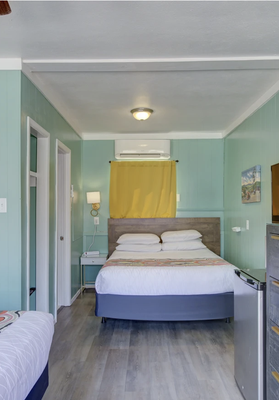Double Queen Room/Triple Queen Suite - All of our Queen and Double Queen bathrooms are fully renovated.