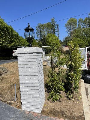 New Bricklaying - Remodeled and added more brick pillars for outdoor lights. New Bricklaying - Remodeled and added more brick pillars for outdoor lights.