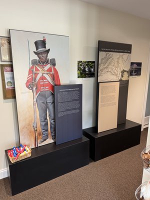 New Exhibit! Black Red Coats on the Chesapeake - "Black Red Coats on the Chesapeake Bay: Freedom Seeking Soldiers from Tangier to Trinidad" is a new exhibit researched and crafted by Dr. Tayzhuan Glover. It covers the start of the Colonial Marines, a regiment in the British military started during the War of 1812 and made up entirely of formerly enslaved people from the Chesapeake, and follows their stories after the war as they spread across Nova Scotia, England, and Trinidad. New Exhibit! Black Red Coats on the Chesapeake - "Black Red Coats on the Chesapeake Bay: Freedom Seeking Soldiers from Tangier to Trinidad" is a new exhibit researched and crafted by Dr. Tayzhuan Glover. It covers the start of the Colonial Marines, a regiment in the British military started during the War of 1812 and made up entirely of formerly enslaved people from the Chesapeake, and follows their stories after the war as they spread across Nova Scotia, England, and Trinidad.