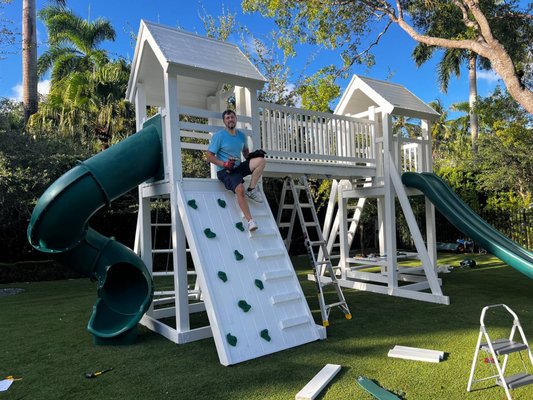 Installation of a Custom Outdoor Playhouse for Children - We successfully assembled and installed a large wooden playhouse designed for children's outdoor recreation. The project included constructing two elevated towers connected by a bridge, installing a spiral tube slide and a straight slide, and mounting a climbing wall with safety grips. All elements were securely fastened and tested for stability and durability.
The project was completed on time and tailored to the client’s request for a safe and fun play space. Installation of a Custom Outdoor Playhouse for Children - We successfully assembled and installed a large wooden playhouse designed for children's outdoor recreation. The project included constructing two elevated towers connected by a bridge, installing a spiral tube slide and a straight slide, and mounting a climbing wall with safety grips. All elements were securely fastened and tested for stability and durability.
The project was completed on time and tailored to the client’s request for a safe and fun play space.