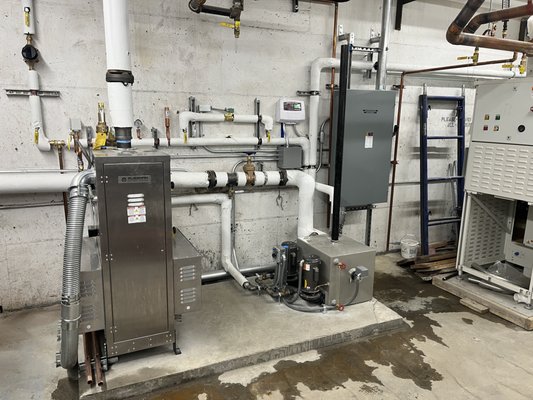 Electric Boiler feed and control wiring - Zuntek handled the electrical scope of the project with precision:
Installed a 3-Phase 220V 400MCM 4-wire feeder, running 150 feet from the electrical room to the boiler room to power the electric boiler.
Completed all control wiring, including connections for the HeatTimer system, two hot water return sensors, an outdoor temperature sensor, and water feed pumps.
All work was executed to ensure safe and reliable operation of the system. Electric Boiler feed and control wiring - Zuntek handled the electrical scope of the project with precision:
Installed a 3-Phase 220V 400MCM 4-wire feeder, running 150 feet from the electrical room to the boiler room to power the electric boiler.
Completed all control wiring, including connections for the HeatTimer system, two hot water return sensors, an outdoor temperature sensor, and water feed pumps.
All work was executed to ensure safe and reliable operation of the system.