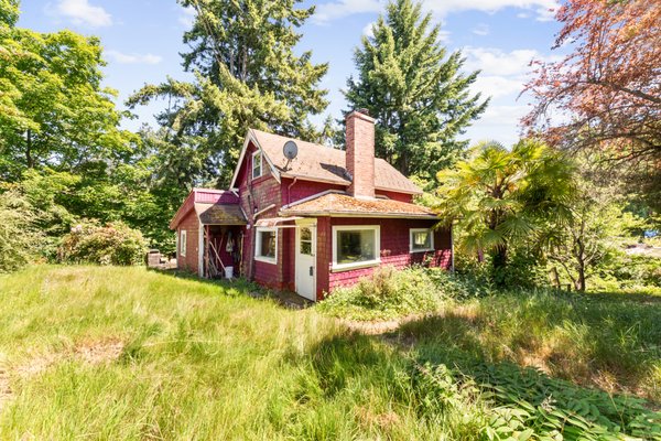 3539 Nokomis Rd SE Port Orchard - Value in land, existing homesite precedence for rebuilding on this peaceful property filled with charm, nostalgia, & history. House requires rebuilding or total remodel. Enjoy the beach life approx 1000 ft away. Your own private nature preserve abounding with wildlife. Rebuild current home and restore to it's former glory or build a new custom Southworth dream home. Chimney & hearth built with Southworth Brick factory bricks. Beams under addition washed up on the beach just down the road & drug to the site to add more living space. Much of the heavy lifting has been completed by current and previous owners: custom new home foundation drawings using current standing footprint, asbestos abatement & Geotech survey completed -2017. Sold as is.