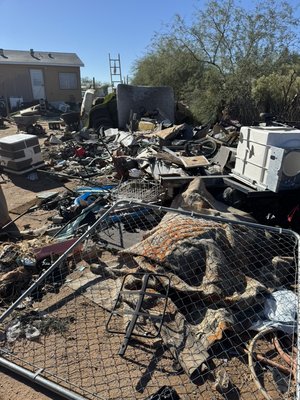 Hoarder Trailer Cleanout - Full property cleanout completed by Shane’s Stellar Junk Removal in Tucson, AZ. This job involved removing large piles of trash, broken furniture, fencing, appliances, and general debris that had accumulated throughout the yard.

Our team loaded and hauled away multiple trailer loads of junk, restoring the property and leaving the yard cleared and accessible again.

Projects like this are common for property cleanouts, rental turnovers, estate cleanouts, and large junk removal jobs where a significant amount of debris needs to be removed quickly and efficiently.