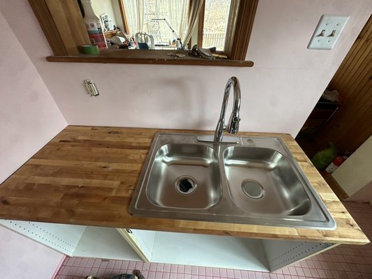 Millvale - We installed new IKEA cabinets after the owner pre- assembled them.
We installed the anchors and tracks as well as cut and installed the butcher block counter top. Millvale - We installed new IKEA cabinets after the owner pre- assembled them.
We installed the anchors and tracks as well as cut and installed the butcher block counter top.