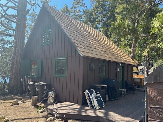 Pinecrest Lake - This is a special project we did on Pinecrest Lake. The home is located on the other side of the lake and can only be accessed by boat or hiking in.    On this particular project we installed Sugar Pine Shingles that were hand split locally in Long Barn, Ca by Armstrong Logging.  We specialize in high elevation roof installations and consider the Highway 108 corridor our back yard.