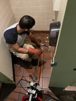 Commercial mainline clog - Pulled toilet to cable main line clog in a commercial building. We offer both Residential and Commercial Services. We focus on Drain Services only (Cleaning and Installations) either on the inside or outside of the home or building. Emergency Services also available.