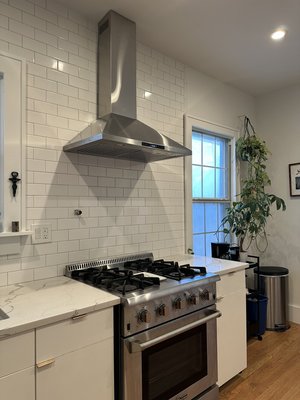 Kitchen hood installation - Installed and vented a stainless steel kitchen range hood, including mounting, electrical connection, and performance testing. Kitchen hood installation - Installed and vented a stainless steel kitchen range hood, including mounting, electrical connection, and performance testing.