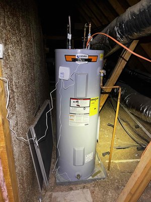 Electric Storage Tank Water Heater - This is the standard water heater most homes have.
How it works:
It stores 30–80 gallons of hot water in a tank.
Electric heating elements inside the tank heat the water.
It keeps that water hot 24/7.
When you use hot water, it pulls from the tank.
Once empty, you wait for it to reheat.
Pros:
✔ Lower upfront cost
✔ Simple installation
✔ Common and easy to replace
Cons:
❌ Can run out of hot water
❌ Uses energy all day to keep water hot
❌ Larger footprint Electric Storage Tank Water Heater - This is the standard water heater most homes have.
How it works:
It stores 30–80 gallons of hot water in a tank.
Electric heating elements inside the tank heat the water.
It keeps that water hot 24/7.
When you use hot water, it pulls from the tank.
Once empty, you wait for it to reheat.
Pros:
✔ Lower upfront cost
✔ Simple installation
✔ Common and easy to replace
Cons:
❌ Can run out of hot water
❌ Uses energy all day to keep water hot
❌ Larger footprint