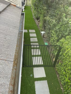 Gutter & Downspout Cleaning - This two story home gutter system hadn’t been cleaned for a year. After downspout clearing, I was able to properly clean the rest of the gutter system.