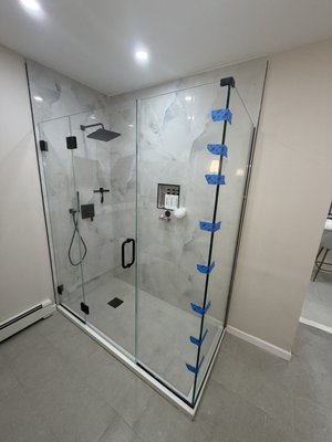 Bathroom doors, showers - Transform your bathroom with custom glasswork by G&E Glass Corp. We specialize in beautiful, modern shower doors and glass enclosures, including frameless and framed designs, custom mirrors, and bathroom glass installations. Every project is measured and installed with precision for a clean, elegant finish that enhances your space. From simple upgrades to fully customized glass solutions, we focus on quality craftsmanship, attention to detail, and customer satisfaction. Serving homeowners, contractors, and builders throughout New York and New Jersey. Contact G&E Glass Corp for your next bathroom glass project!