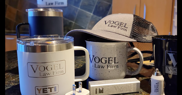 Vogel Law Merch - Prestigious Law Firm. Prestigious Products. The marketing team at Vogel Law chooses to work with Go Promo when it comes to promo products and custom apparel because they know we deliver high-quality products at a great price and we deliver them on time! Vogel Law Merch - Prestigious Law Firm. Prestigious Products. The marketing team at Vogel Law chooses to work with Go Promo when it comes to promo products and custom apparel because they know we deliver high-quality products at a great price and we deliver them on time!