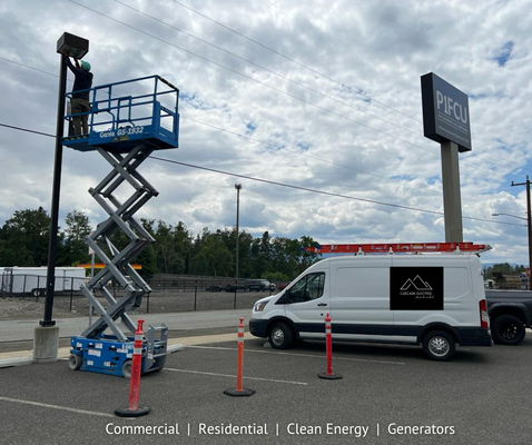 Commercial - Changing out parking lot lights to make them brighter and more energy efficient. Commercial - Changing out parking lot lights to make them brighter and more energy efficient.