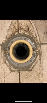 Toilet Flange Repair - Pipeline Plumbing was initially called out for water coming from the base. After pulling the toilet bowl and removing the wax ring we found that the leak was caused by the improper Installtion of the abs flange.
Previously installed fl age was not secured and had started to leak because the bowl was no longer securing the wax ring.
Cut out existing flange and installed new stainless steel flange with polymer coated exterior screws.
Installed closet bolts and applied a bit of water stop concrete in all the open areas.
Put down new sanitary waste seal and set toilet bowl.
Turned on water ,flushed toilet ,and check system for leaks.