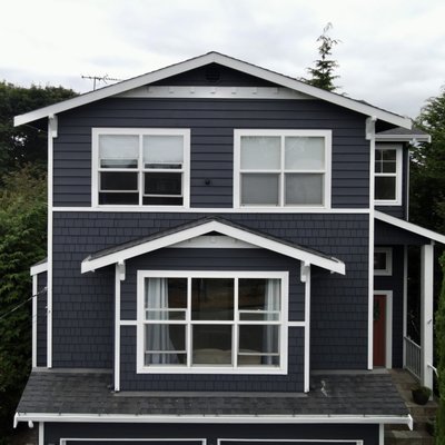 West Seattle Exterior Painting - This house was pressure washed, fully prepped, and painted to meet the client's needs. The new blue color with a beautiful white trim gives this home a nice modern look. West Seattle Exterior Painting - This house was pressure washed, fully prepped, and painted to meet the client's needs. The new blue color with a beautiful white trim gives this home a nice modern look.