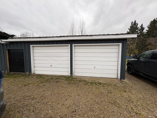 Garage Door Make over - These were some old doors we took out and replaced with these stylish black doors with windows, we also put in new openers for this customer as well