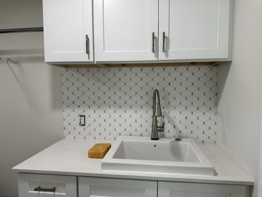 Backsplash in laundry room - Installed backsplash on small area in laundry room Backsplash in laundry room - Installed backsplash on small area in laundry room