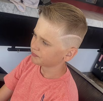Kids haircut, style and design. - We love helping our customers and providing styles they love. Kids haircut, style and design. - We love helping our customers and providing styles they love.