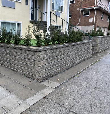Retaining Wall - We installed new block walls and removed existing concrete walls. Regrade backyard fixed sloped backyard.