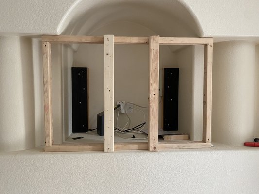 Framed for a tv mount - Client wanted tv mounted outside the hole. Built a frame and attached it to the existing walls and mounted tv on frame. Framed for a tv mount - Client wanted tv mounted outside the hole. Built a frame and attached it to the existing walls and mounted tv on frame.