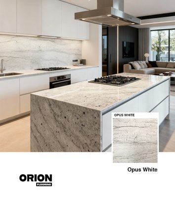 Opus White - Opus White – Premium Quartzite for Modern Kitchen Countertops
Enhance your kitchen with the pure elegance of Opus White Quartzite, a natural stone that combines timeless beauty with exceptional durability. With its soft white surface accented by gentle gray and silver veining, Opus White offers a clean and luxurious look that fits perfectly into both modern and classic interiors.
Because of its neutral tones and natural luster, Opus White Quartzite blends effortlessly with any color palette. Its smooth, polished finish reflects light beautifully, creating a sense of brightness and openness throughout the kitchen. At the same time, the subtle veining adds just enough visual depth to make every surface unique and captivating.
In addition, Opus White stands out for its strength and resilience. Thanks to its natural resistance to heat, scratches, and stains, it maintains its polished appearance even after years of use. As a result, this quartzite is as functional as it is beautiful, offering both practicality and sophistication for everyday living.
Moreover, each slab of Opus White Quartzite tells its own story through its delicate patterns and gentle color transitions. Whether used for a grand kitchen island or elegant countertops, this stone brings a sense of harmony, balance, and refined luxury to every design. Opus White - Opus White – Premium Quartzite for Modern Kitchen Countertops
Enhance your kitchen with the pure elegance of Opus White Quartzite, a natural stone that combines timeless beauty with exceptional durability. With its soft white surface accented by gentle gray and silver veining, Opus White offers a clean and luxurious look that fits perfectly into both modern and classic interiors.
Because of its neutral tones and natural luster, Opus White Quartzite blends effortlessly with any color palette. Its smooth, polished finish reflects light beautifully, creating a sense of brightness and openness throughout the kitchen. At the same time, the subtle veining adds just enough visual depth to make every surface unique and captivating.
In addition, Opus White stands out for its strength and resilience. Thanks to its natural resistance to heat, scratches, and stains, it maintains its polished appearance even after years of use. As a result, this quartzite is as functional as it is beautiful, offering both practicality and sophistication for everyday living.
Moreover, each slab of Opus White Quartzite tells its own story through its delicate patterns and gentle color transitions. Whether used for a grand kitchen island or elegant countertops, this stone brings a sense of harmony, balance, and refined luxury to every design.