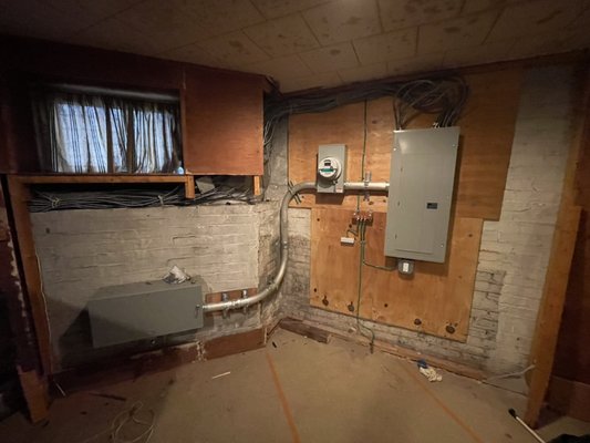 Service upgrade to 200amp - We dug up trench outside of the house according to install conduit for service wires, installed new end line box aka Coned box, new meter bank, breaker panel and ground. Then we transferred old circuits to new breaker panel